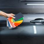 car-wrapping-male-hand-with-protective-vinyl-foil-film-color-palette-worker-makes-auto-detailing-automobile-paint-protection-coating-professional-tuning